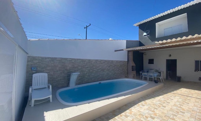 Jardim Virginia House | Sobrado com piscina e área gourmet na praia da Enseada