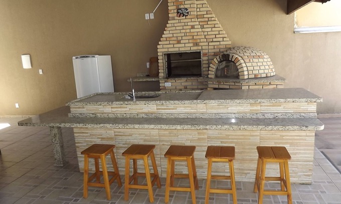 Jardim California House | SOBRADO WITH 03 BEDROOMS AND POOL CENTER CARAGUATATUBA NEXT TO THE BALL OF EVENTS
