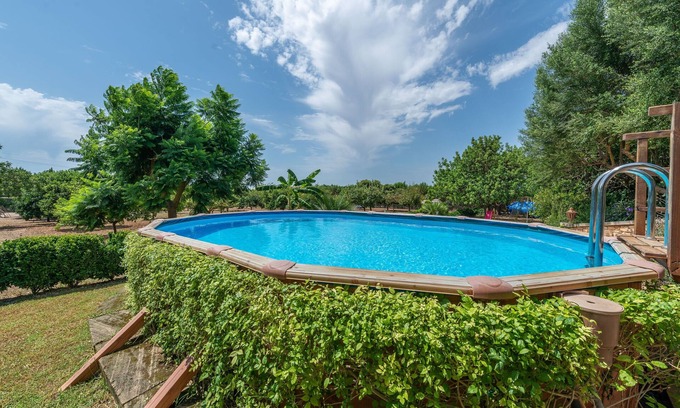 Manacor House | SON LLORINGO - Beautiful villa with private above ground pool, a beautiful garden and view