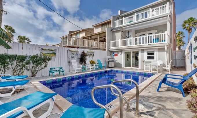 South Padre Island House | Southern Comfort: Beautiful Beach House with Heated Pool. Dog-Friendly and Steps to Beach!