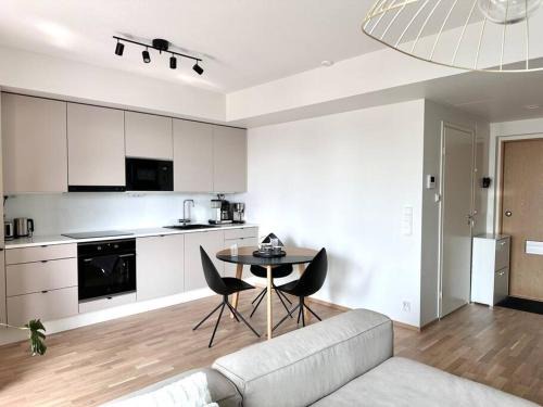 Keskinen District Apartment | Spacious 1BR With Balcony