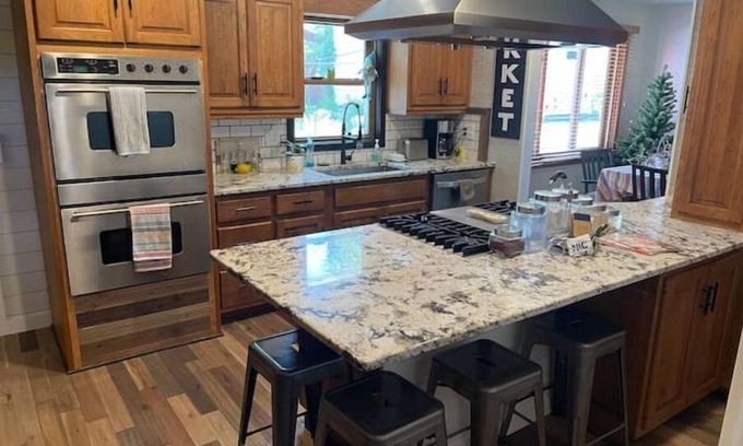 Rhinelander House | Spacious 3BR 2BA home overlooking Boom Lake & Hodag Park, boat slip available