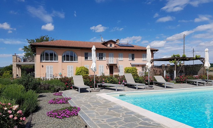 Castiglione Tinella Apartment | Spacious apartment in beautifully renovated property with shared pool and garden