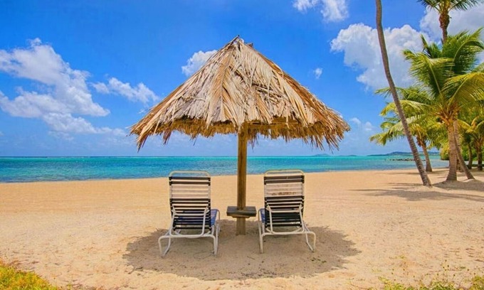 Orange Grove Condo | Spacious BEACHFRONT Condo with STUNNING Buck Island & Sea Views.