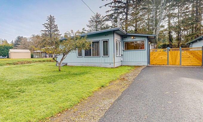 Coos Bay House | Spacious coastal property with separate living quarters, wood stove, & grill