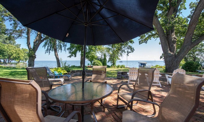 Oshkosh House | Spacious Home on the Water with Indoor Pool and Room For Everyone!
