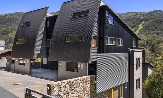 Thredbo Apartment | Spacious luxury in the village, gas fire, spa bath, Foxtel, expresso machine, BBQ & private Balcony