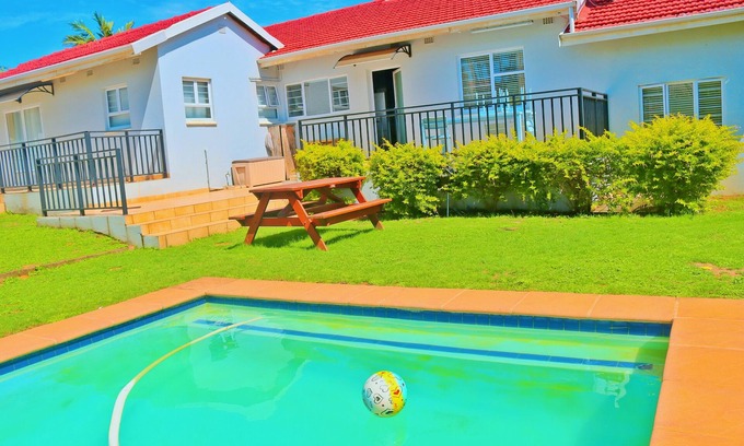 Bluff Villa | Spacious urban home with private pool in the backyard. 5 minutes from the beach.