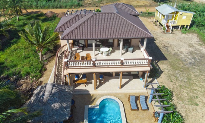 Sittee River Villa | Spectacular Oceanfront 3/3 Villa with Private Beach, Pool, and Dock