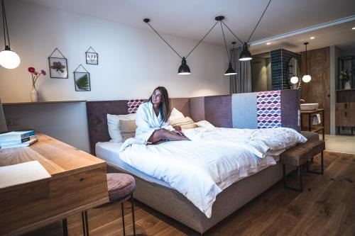 Kaprun Hotel | Sport & Wellness Hotel Das Falkenstein - Natural Swimming Lake - Matrix GYM - Summercard inklusive - Authentic experience - Flying wellness with Pool