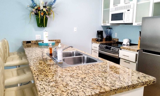 South Padre Island Condo | STAR BEACHSIDE 107 (3-Bedroom Condo) with Pool by RedAwning