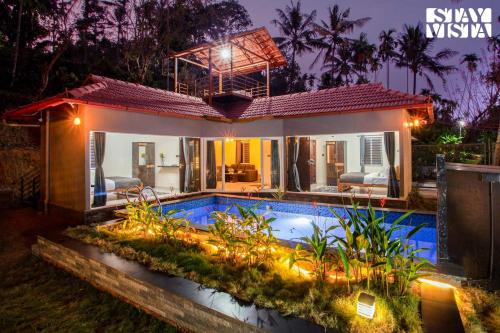 Mananthavady Villa | StayVista at Palm Tree Homes with Complimentary Breakfast, BBQ Grill and Pet-Friendly Home