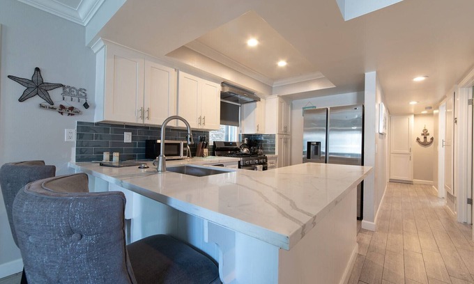 Balboa Peninsula Condo | Steps to Sand or Fun Zone/Balboa/large patio/BBQ