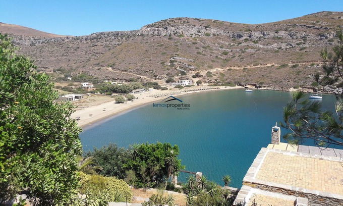 Kea Villa | Stone built waterfront villa with direct access to the sandy beach of Spathi,