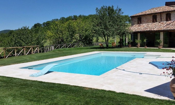 Genga Villa | Stone villa, with private pool, immersed in the greenery of Frasassi Park.