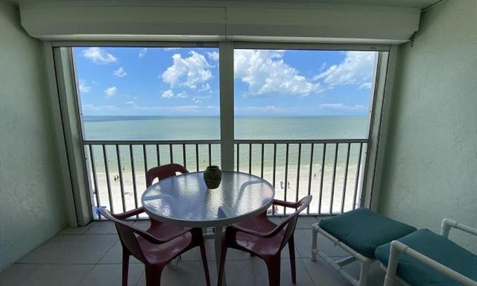 Mid Island House | Strandview #603 - Beachfront condo with screened-in patio and amazing view!