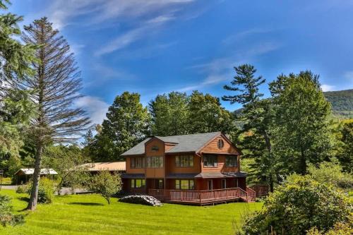 Jewett Center House | Stream-Side Atrium Home with Side Rooms & Pool Table