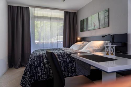 Schluchsee Apartment | Studio 20qm mit Balkon und Innenpool - 22030
