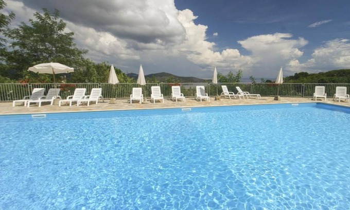 Capoliveri Apartment | Studio Apartment 'Mono Le Lecce 2' with Mountain View, Pool & Balcony