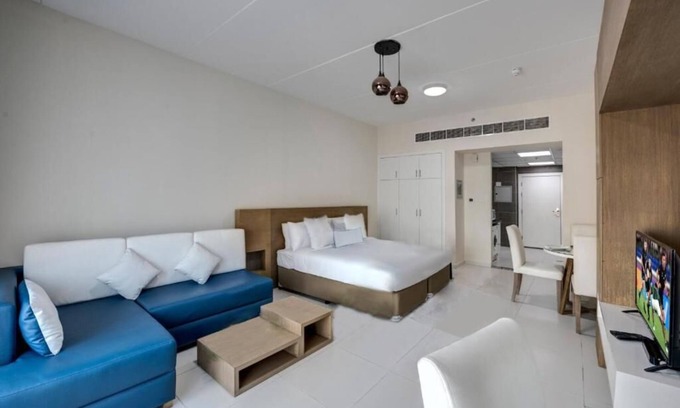 Dubai Investment Park Hotel | Studio Apartment Near Dunes Village Dip By Luxury Bookings