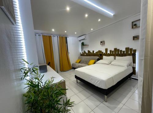Bas du Fort Apartment | Studio en bord de mer- Bas du Fort- citerne d'eau