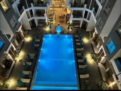 Al Ahyaa Apartment | Studio Imperial resort pool view