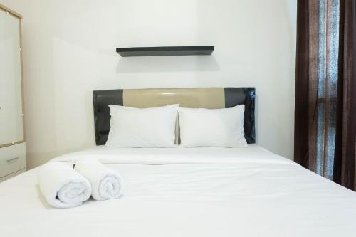 Jakarta Apartment | Studio near Bella Terra Mall at Tifolia Apartment By Travelio