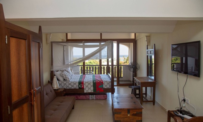 Diani Beach Apartment | Studio Room 308 with a Breath taking view of Diani Beach.