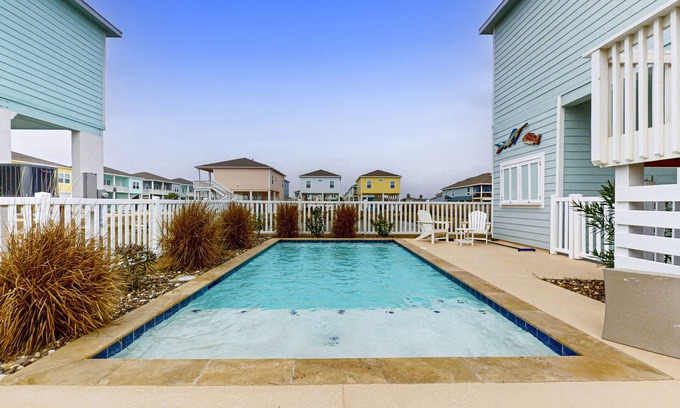 Rockport House | Stunning beach house with balcony and fenced in private pool - steps to sand