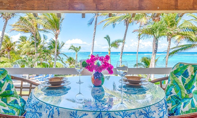 Akumal Condo | Stunning Caribbean views from the wrap around deck, at this beachfront condo!