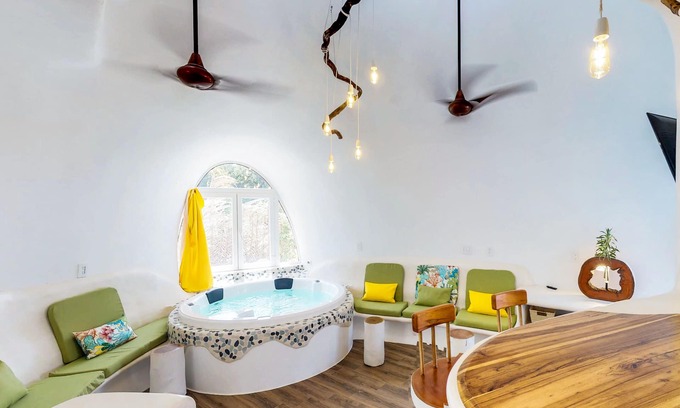 Cocoplum Villa | Stunning lagoon-front villa with pool, private hot tub, & AC