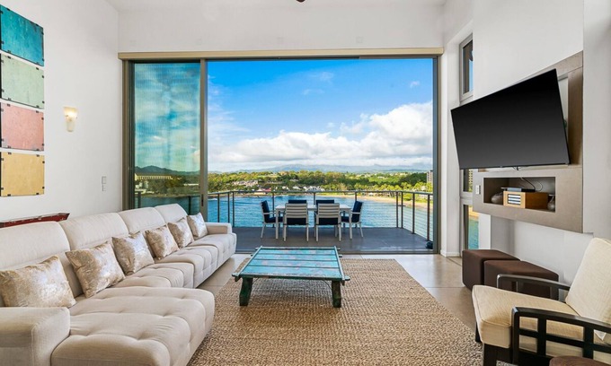 Lihue Apartment | Stunning Oceanfront Penthouse, 14' ft Ceilings and Wall-to-Wall Glass Slider.