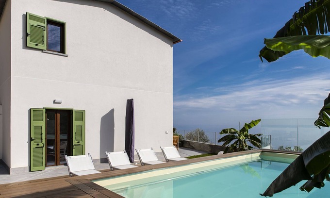 Cipressa Apartment | Stunning sea-view villa with two independent flats.