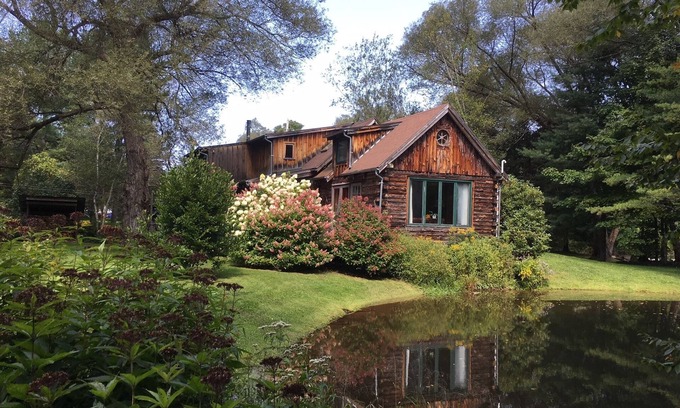Andes House | Stunning, Secluded Log Home Surrounded by Woods and Water