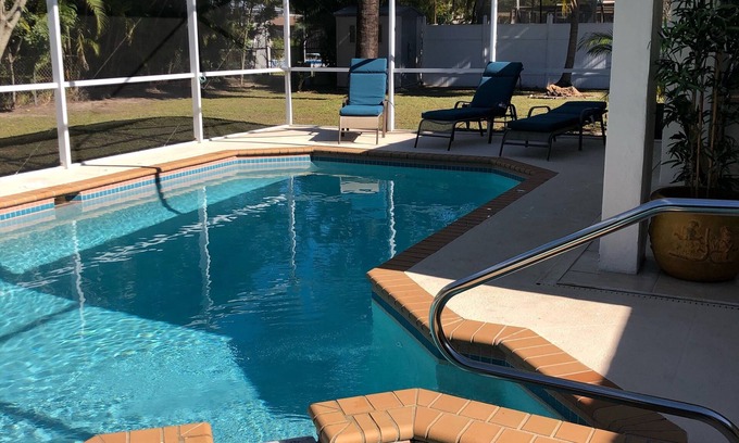 Cypress Lakes Estates House | Stunning Vibrant Vacation Rental with Large Pool And Heatable Spa