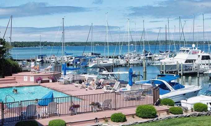Charlevoix Condo | Stunning View Boat House on Lake Charlevoix : Pool-Town