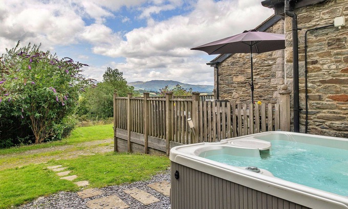 Eglwysbach House | Stunning villa for 4 guests with WIFI, hot tub, terrace, pets allowed and parking