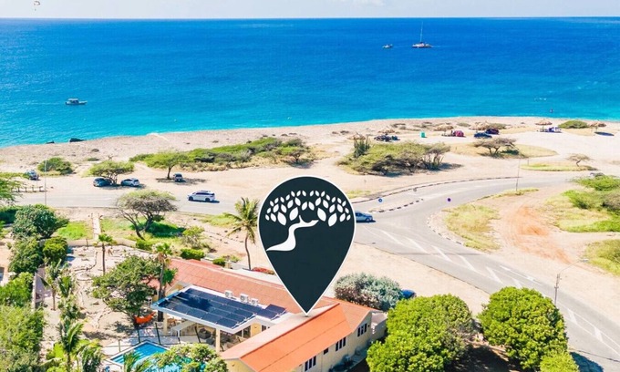 Malmok Villa | Stylish 4-Bedroom Seafront Getaway at Pelican Beach House by Bocobay