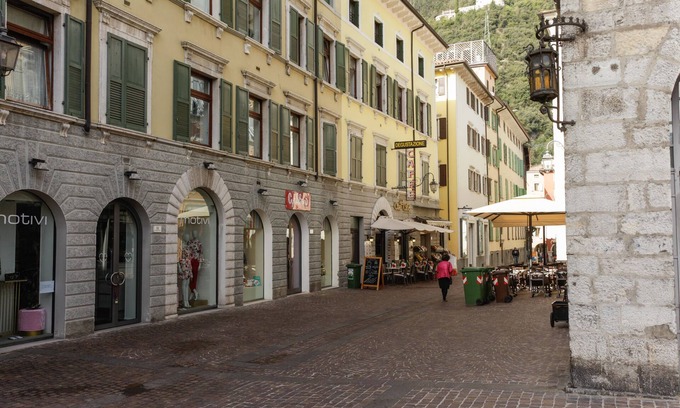 Riva del Garda Apartment | Stylish Apartment "RivApartmentsDowntowN - Travel" with a View of the Old Town of Riva del Garda, A/C & Wi-Fi