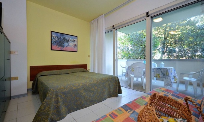 Bibione Pineda Apartment | Stylish studio flat in a building surrounded by a green landscape