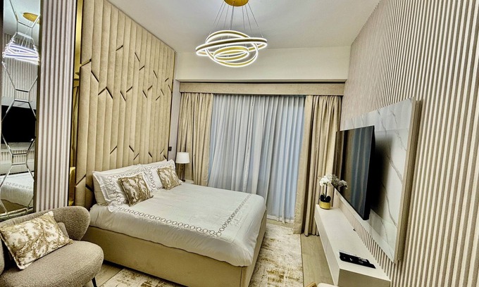 Dubai Apartment | Stylish studio with large balcony & private parking in Azizi Riviera