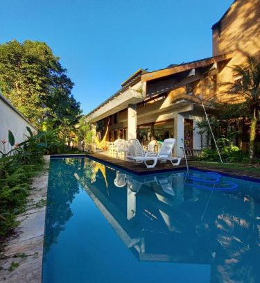 Itamambuca House | Suíte no Condomínio Itamambuca - Muito Perto da Praia !