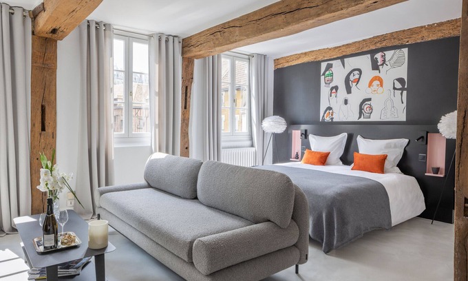 Nogent-le-Roi Apartment | Suite Blanc de Noirs View of Saint-Sulpice church castle and timber-framed house