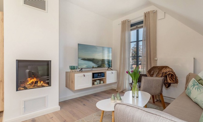 Zingst Apartment | Suite Löwenzahn with fireplace for 4 pers.
