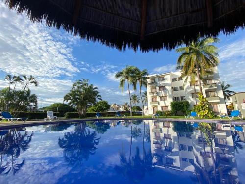 Manzanillo Apartment | Suite las palmas excelente depa con alberca
