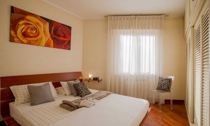 Olbia Apartment | Sunny rooftop loft with gorgeous views of Olbia