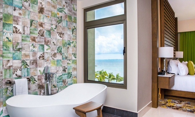 Punta Sam Condo | Sunrise Secrets: Discover Unforgettable Mornings in your 3BR PH in Cancun!