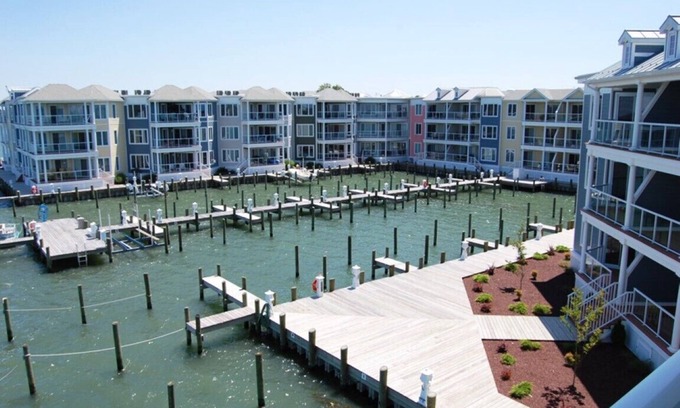 Chincoteague Condo | Sunset Bay Villa 315-WATERFRONT! Pool and Fishing Dock