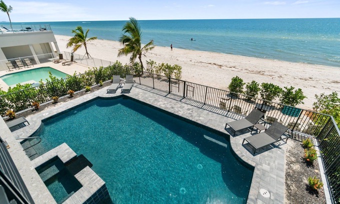 Bonita Springs House | Sunset Beach | Modern, Luxury Beachfront Pool Home | Sleeps 12