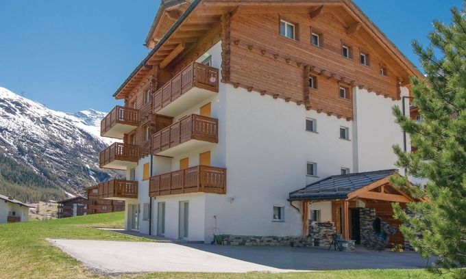 Saas-Fee Apartment | Surrounded by green meadows and with a fantastic view of the surrounding mountains, this vacation ap